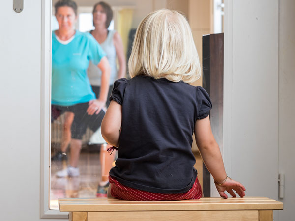 Fitnesslektion mit Kinderhütedienst